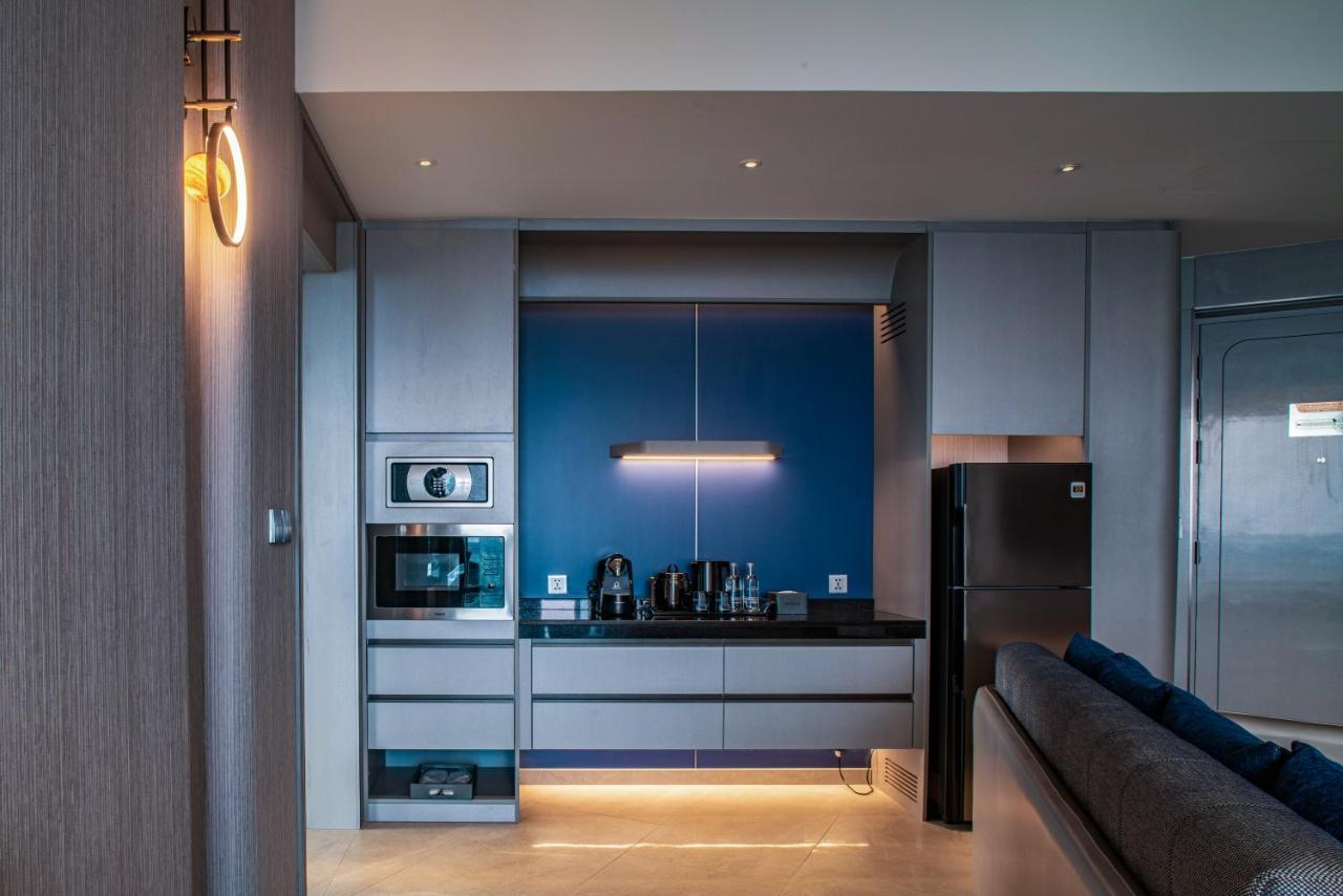 Grande Centre Point Space Pattaya Eksteriør billede A kitchen in a private home